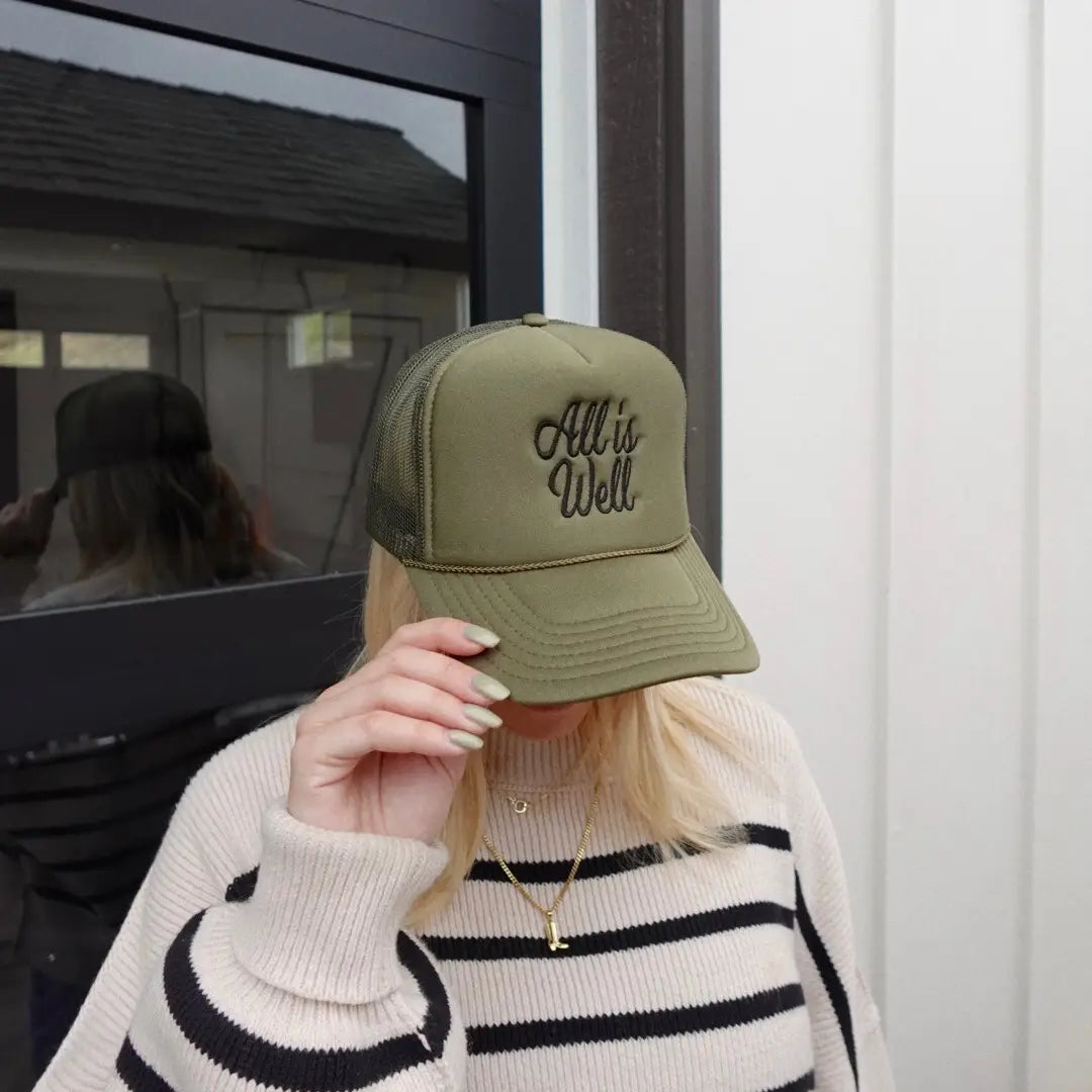 All Is Well Embroidered Trucker Hat.