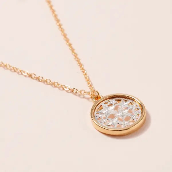 Silver + Gold Star Pendant Necklace.